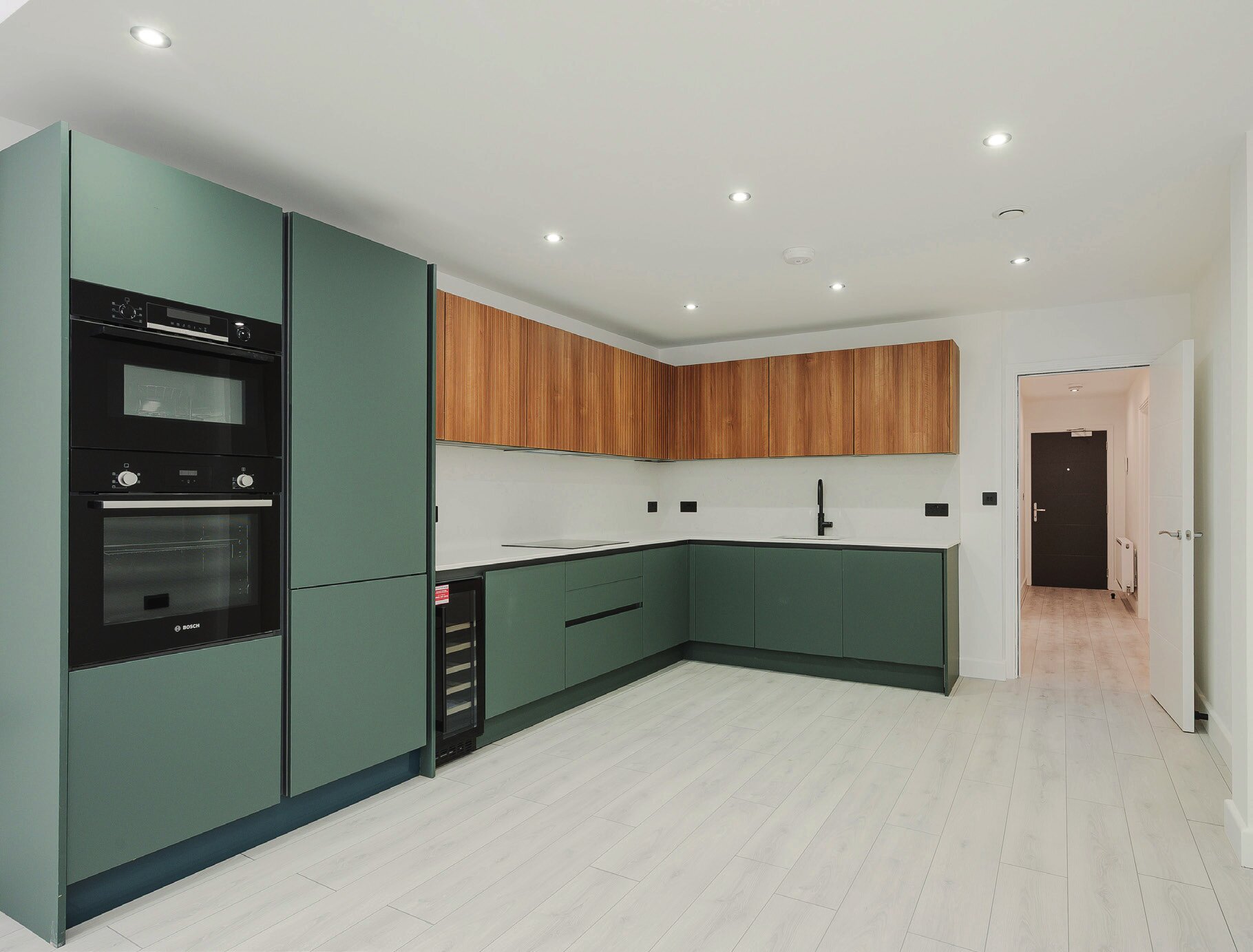 Contemporary Ace Court kitchen with green and oak cabinetry